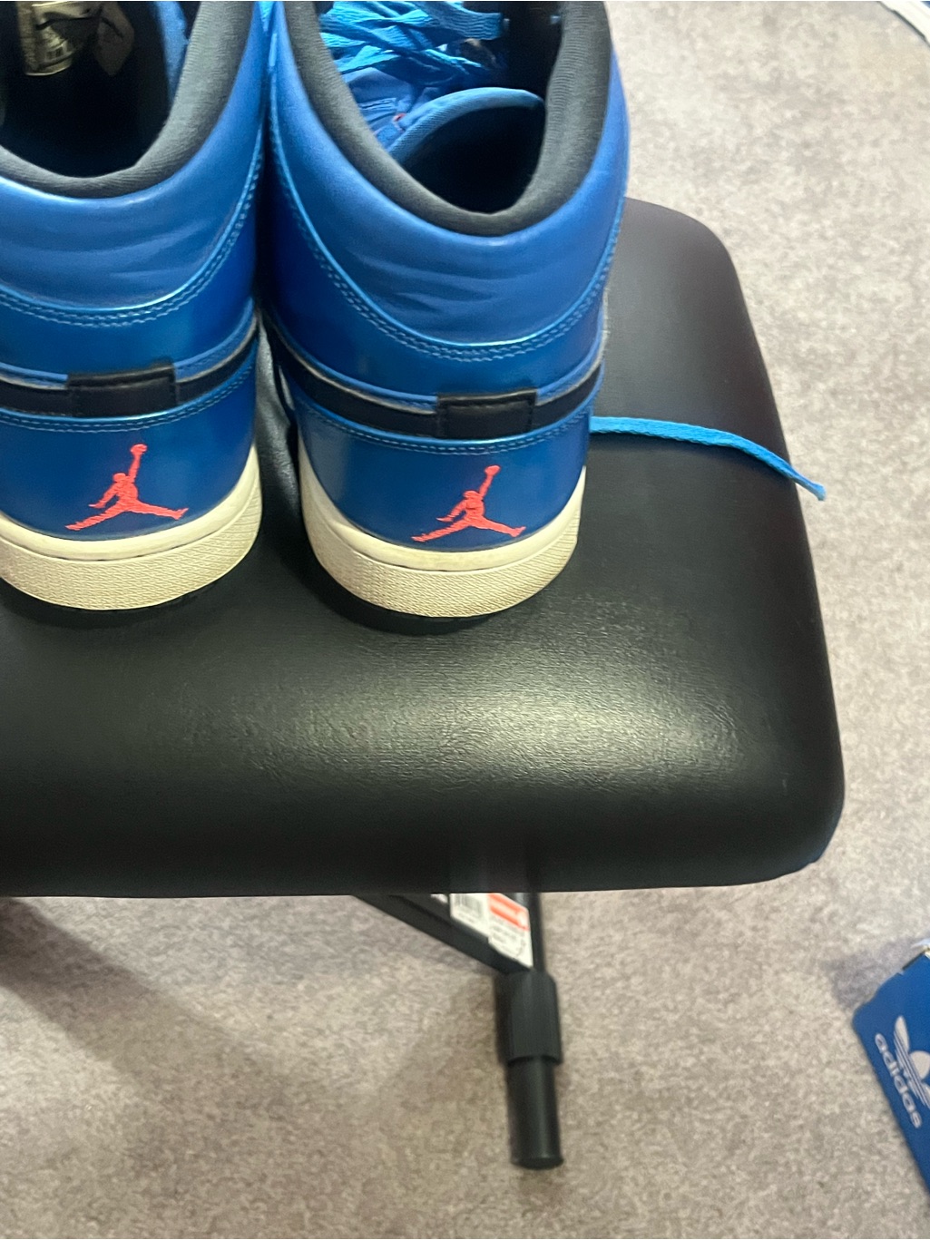 Jordan Blue High-Top Sneakers With Red Jumpman Accent